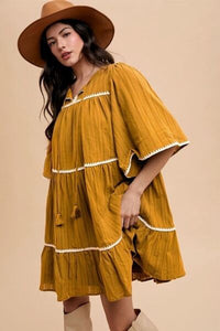 Boho Chic Tassel Contrast Trim Tie Neck Half Sleeve Tiered Dress - Modestly Vogue 