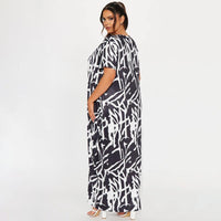 Flattering Curvy Fit | Stylish & Comfortable Plus-Size Clothing | Modestly Vogue Curvy Maxi Dress Abstract Print Black White Comfortable Casual Loose Dress - Modestly Vogue 