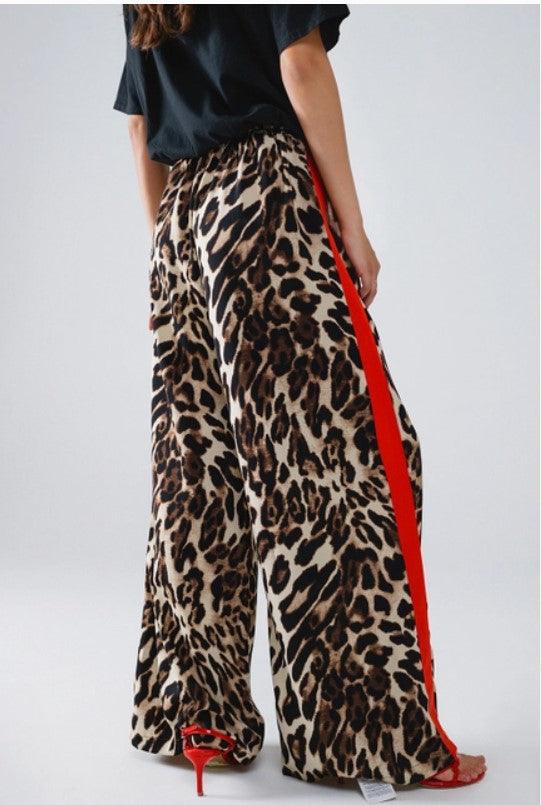 New Arrivals – Fresh, Trendy Fashion for Women | Modestly Vogue Stylish Pants for Women – Trendy & Comfortable Pants for Every Occasion | Modestly Vogue Leopard Straight Pants with Red Stripes Down the Sides - Modestly Vogue 