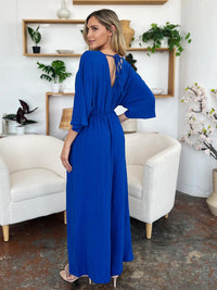 One-Piece Outfits for Every Occasion | Double Take Full Size Surplice Wide Leg Jumpsuit with Pockets - Modestly Vogue 