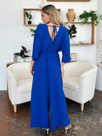 One-Piece Outfits for Every Occasion | Double Take Full Size Surplice Wide Leg Jumpsuit with Pockets - Modestly Vogue 