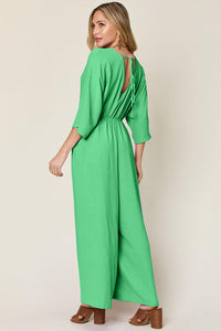 One-Piece Outfits for Every Occasion | Double Take Full Size Surplice Wide Leg Jumpsuit with Pockets - Modestly Vogue 