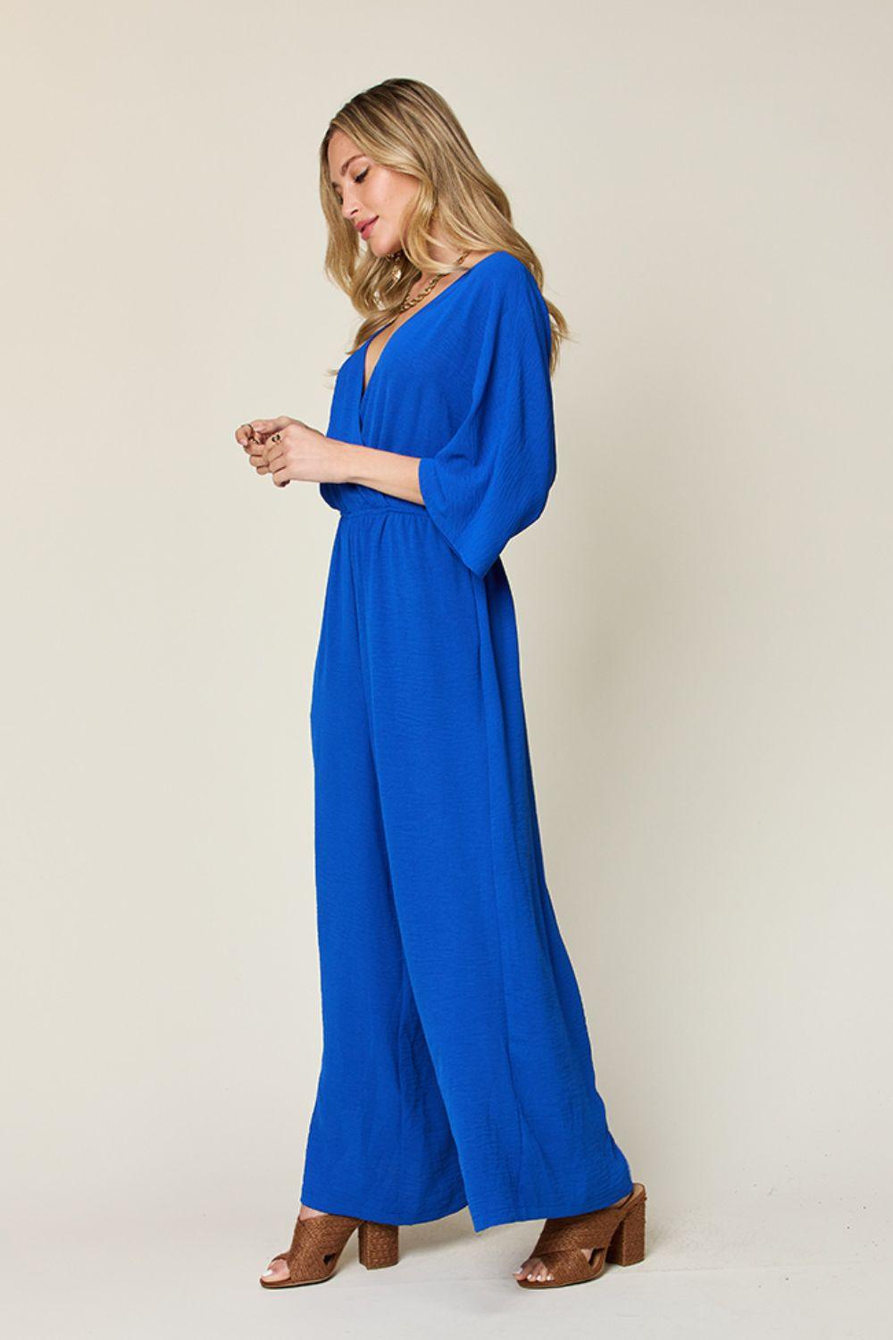 One-Piece Outfits for Every Occasion | Double Take Full Size Surplice Wide Leg Jumpsuit with Pockets - Modestly Vogue 