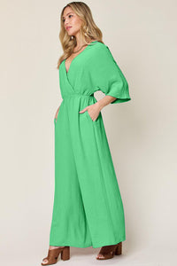 One-Piece Outfits for Every Occasion | Double Take Full Size Surplice Wide Leg Jumpsuit with Pockets - Modestly Vogue 