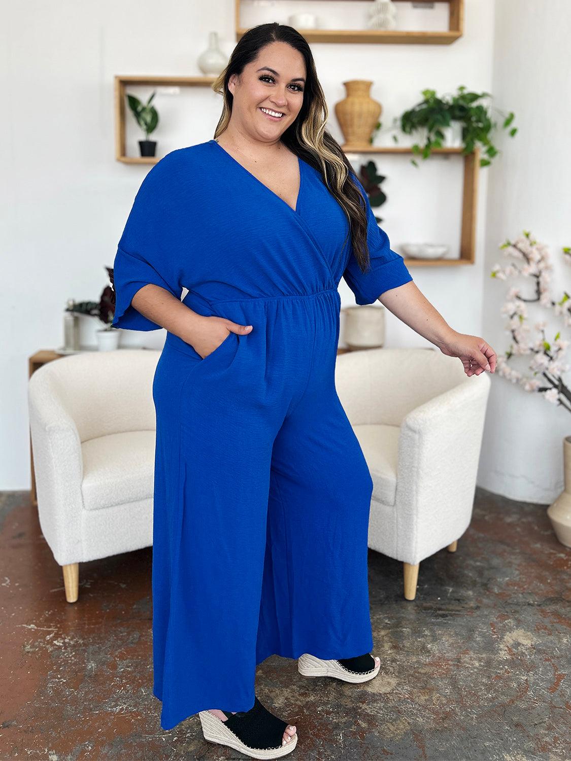 One-Piece Outfits for Every Occasion | Double Take Full Size Surplice Wide Leg Jumpsuit with Pockets - Modestly Vogue 