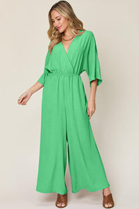 One-Piece Outfits for Every Occasion | Double Take Full Size Surplice Wide Leg Jumpsuit with Pockets - Modestly Vogue 